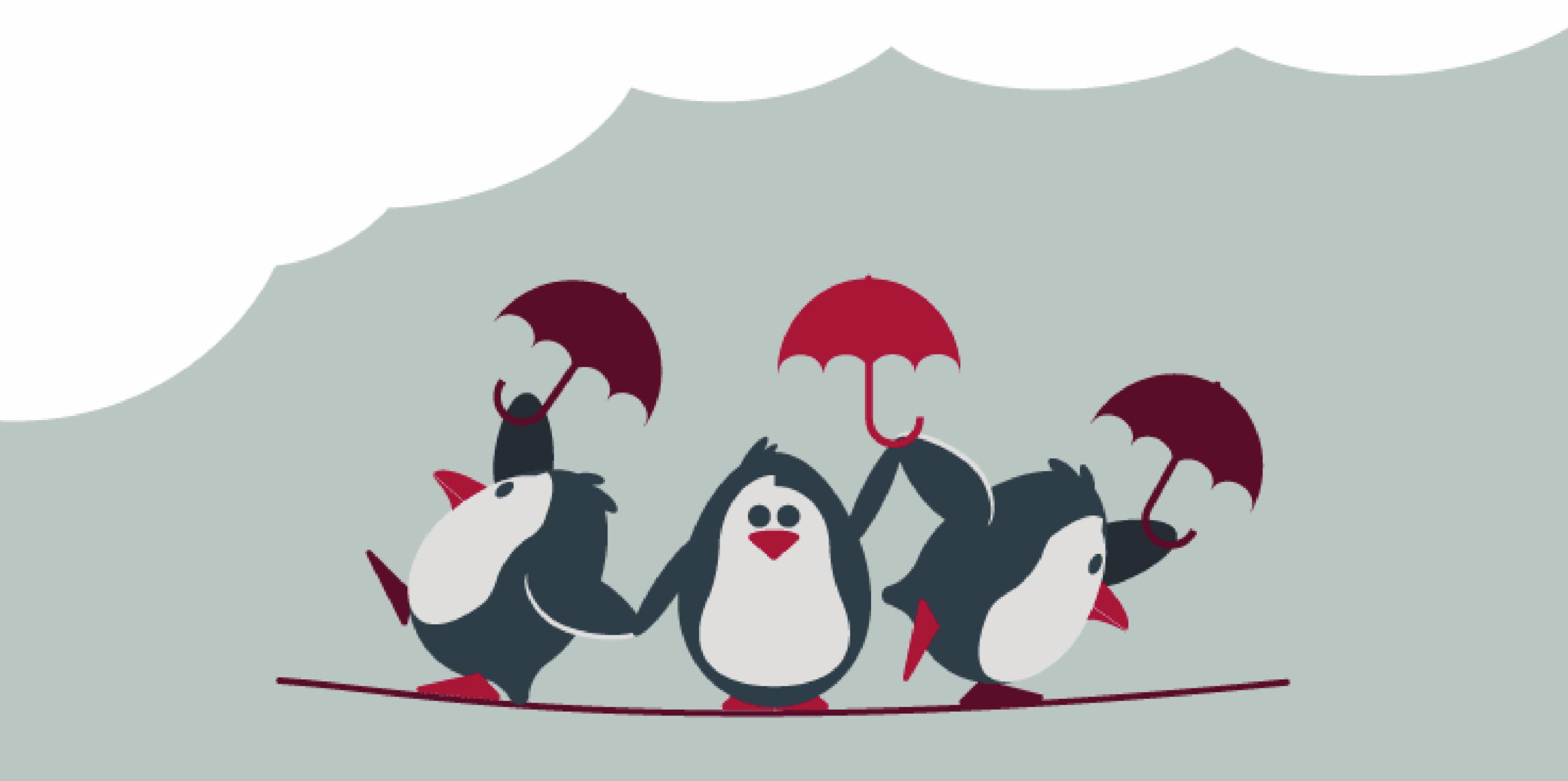 Group of three penguins with umbrellas