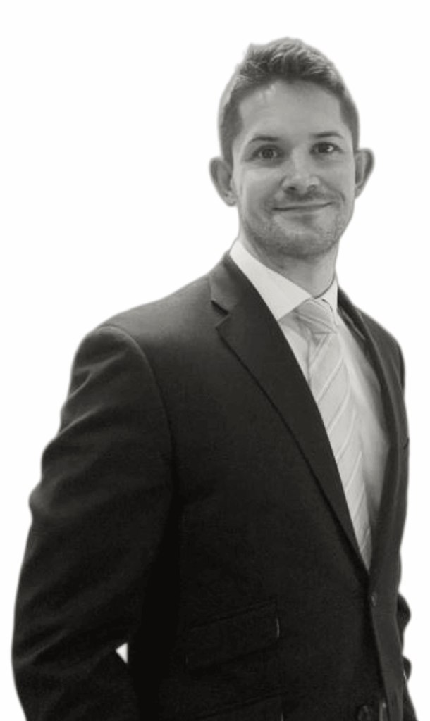 Black and white image of a man wearing a suit